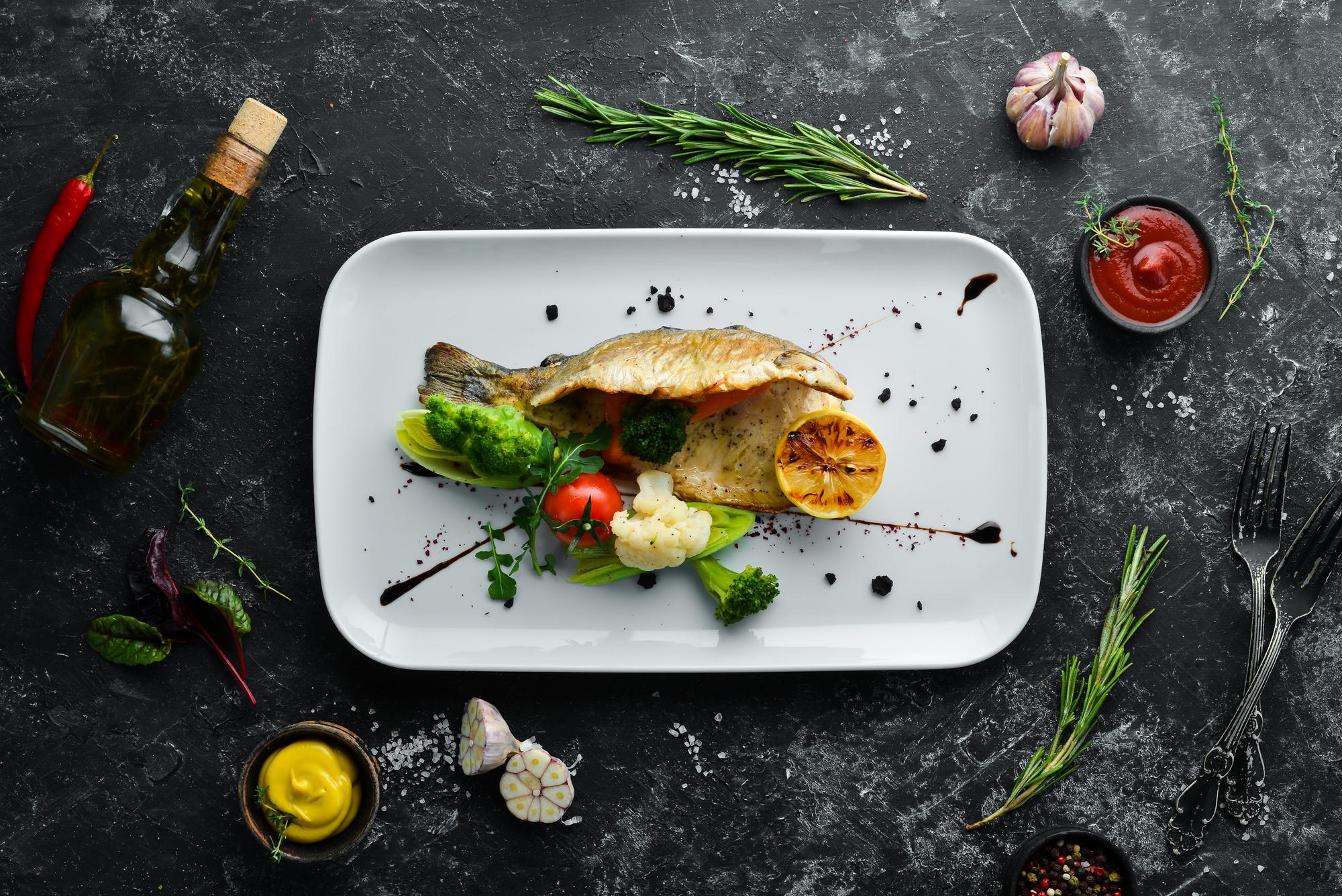 Rustic plated fish with herbs